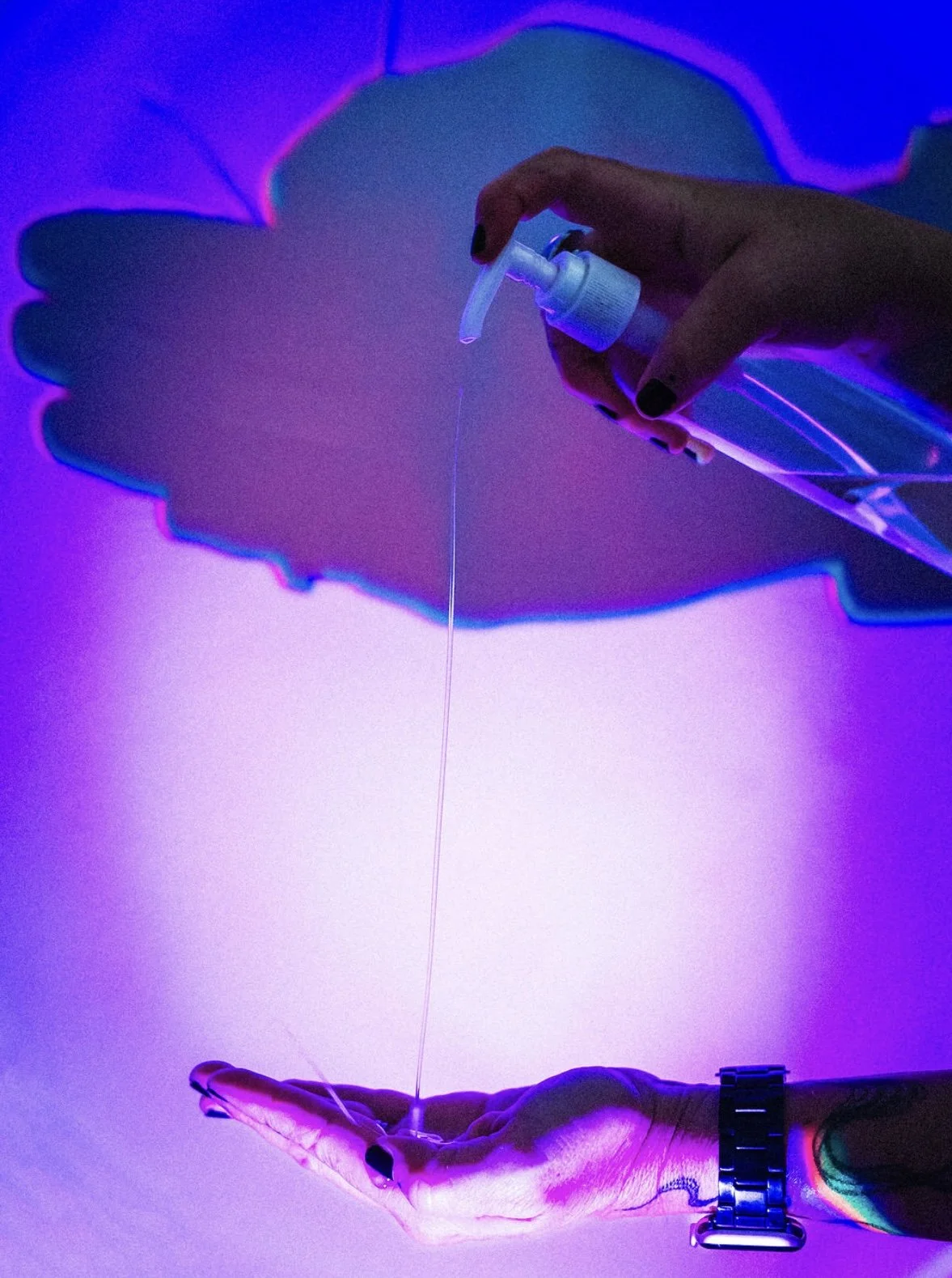 CBD massage oil under neon studio light